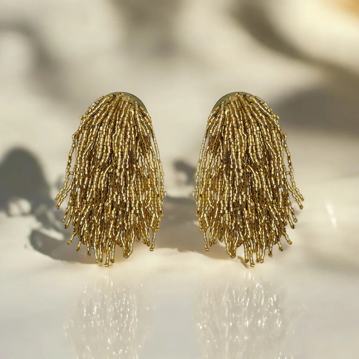 Show Stopper Drape Statement Earrings in Gold